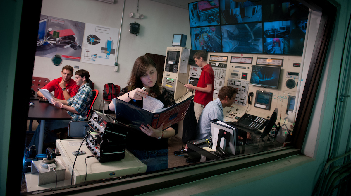 Nuclear engineering students work in the Nuclear reactor in Burlington Labs. Photo by Marc Hall