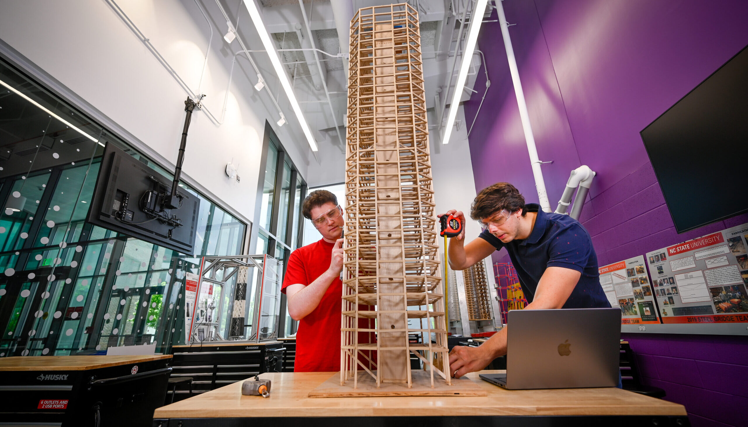 Students work in the Fincher Lab in Fitts-Woolard Hall. NC State University's Department of Civil, Construction, and Environmental Engineering offers undergraduate degrees in civil engineering, construction engineering, and environmental engineering.